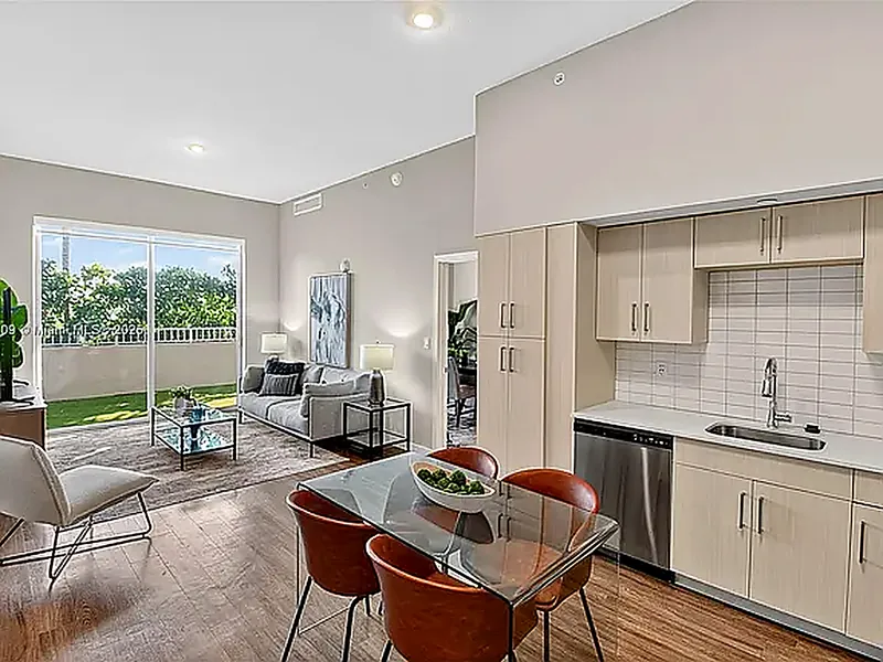 Modern kitchen with quartz countertops and stainless steel appliances