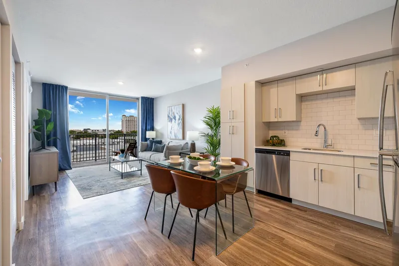 Open kitchen, dining and living room in a Centralis Residences condo