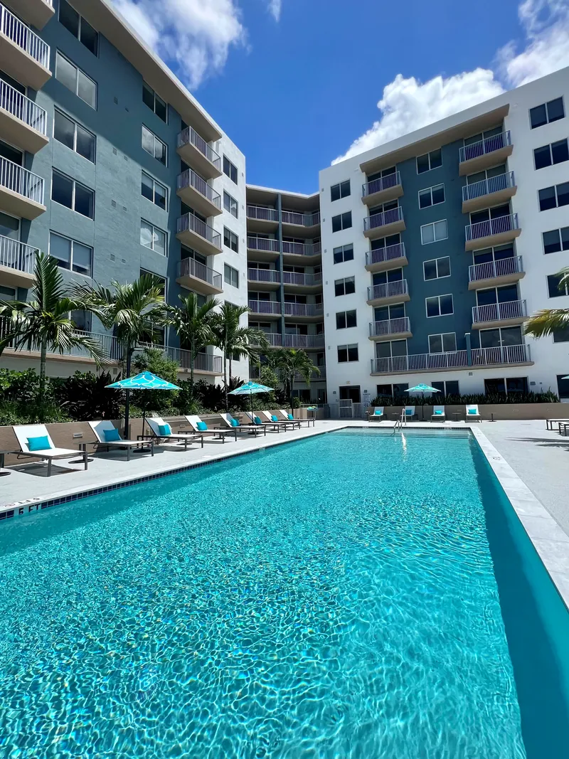Heated pool and sun loungers on the amenity deck
